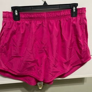 Women’s Nike dri-fit tempo shorts size large fuchsia color